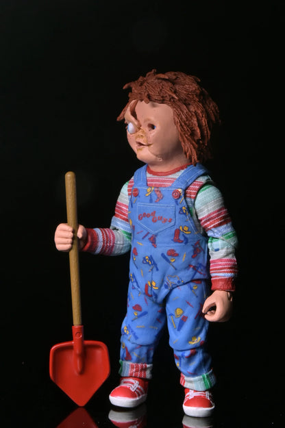 Chucky with spade and disfigured face action figure