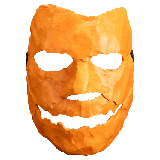 Orange mask with a carved face from Rob Zombie's Halloween