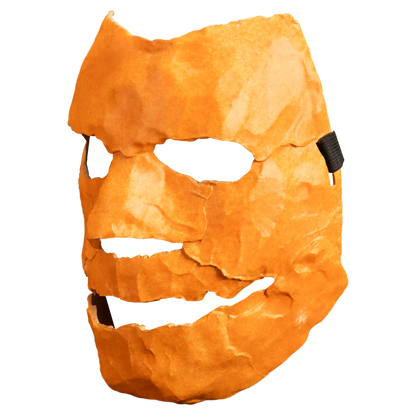 Orange mask with a carved face from Rob Zombie's Halloween