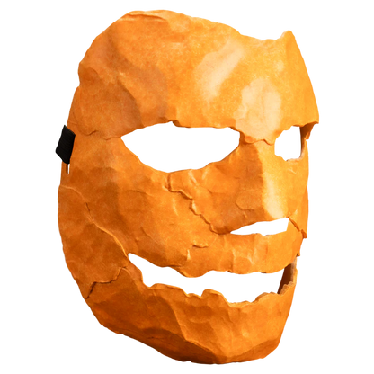 Orange mask with a carved face from Rob Zombie's Halloween